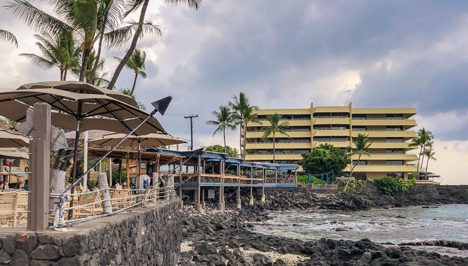 Huggo's on the Rocks Seaside Restaurant and Bar with the Royal Kona Inn in the Background