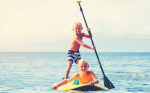 Kids Paddle boarding in Hawaii
