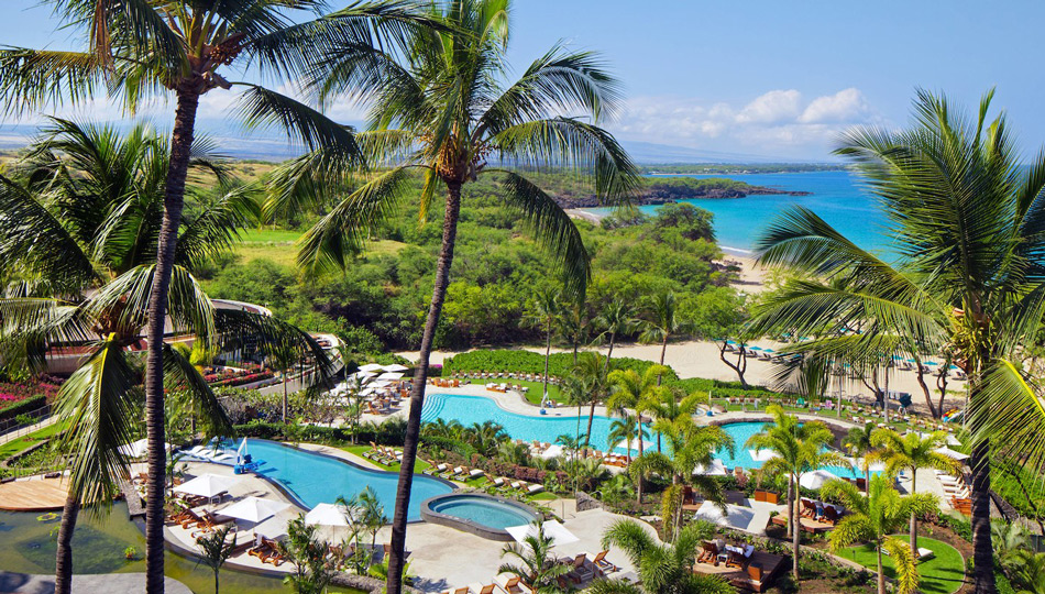 Layered pools and gardens at the Hapuna Beach Resort, leading you down to the beach.