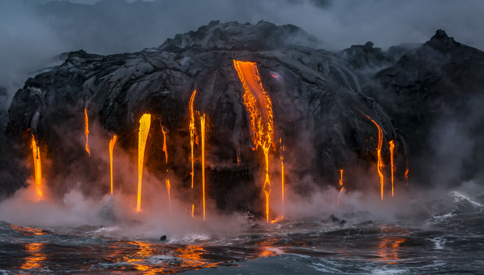Lava Flowing into the ocean on a lava boat tour