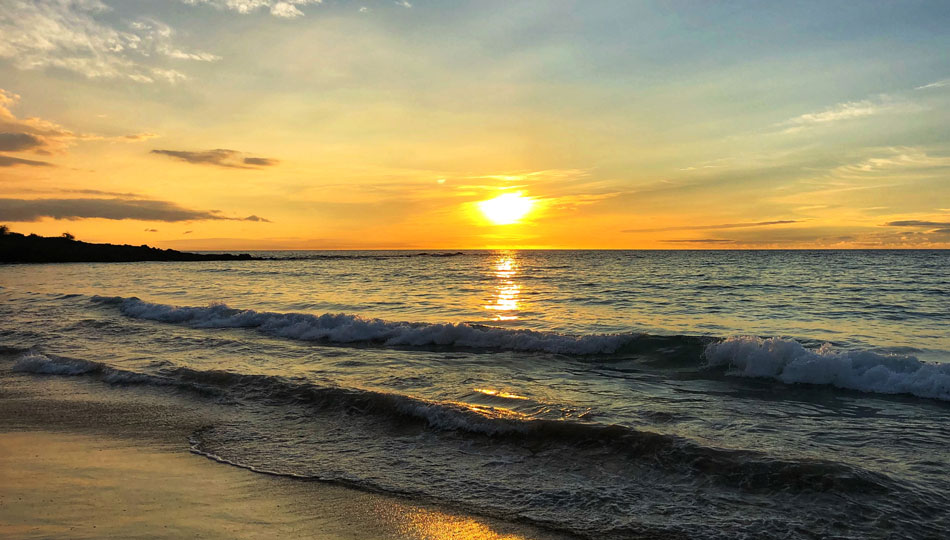Sunset on Kaunaoa Beach also known as Mauna Kea Beach