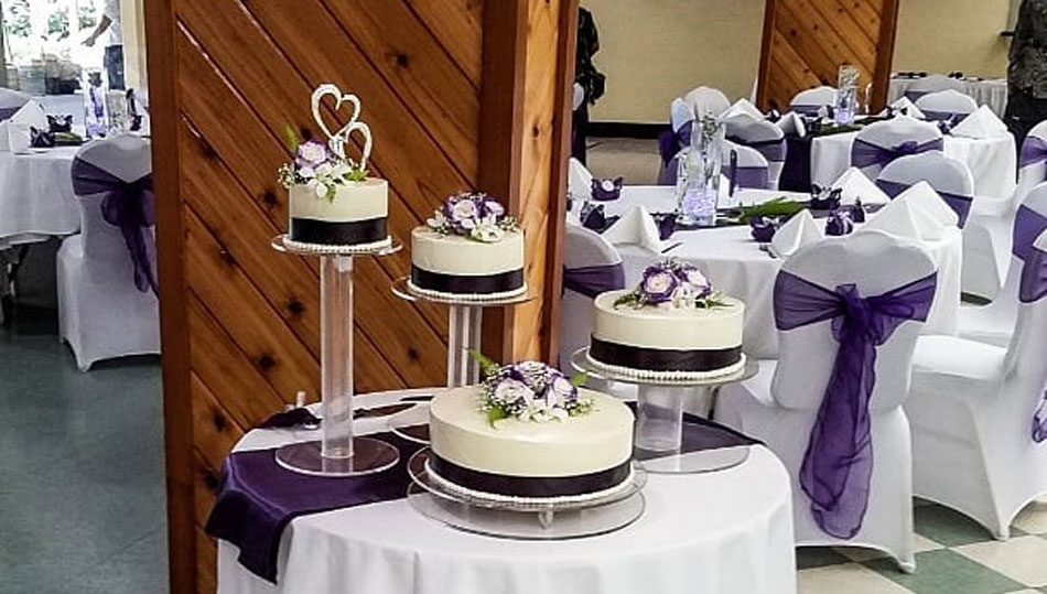Nani Mau Garden Wedding Reception Area with purple decorations
